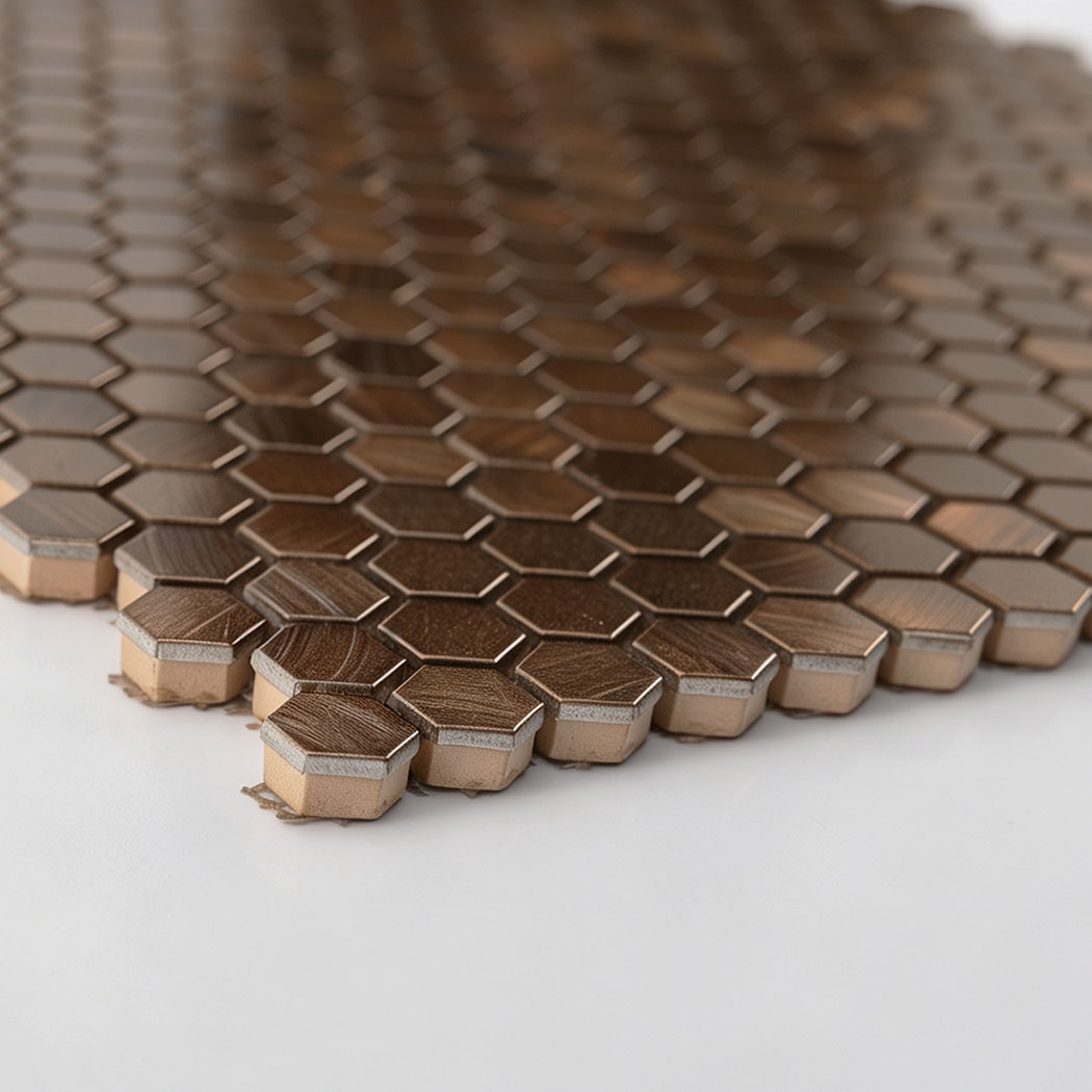Low angle profile view showing thickness of antiqued copper hexagon tile