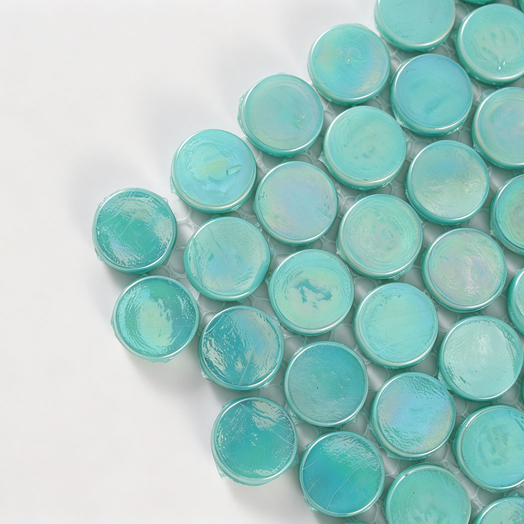 Corner close-up of mint green iridescent round glass mosaic tiles