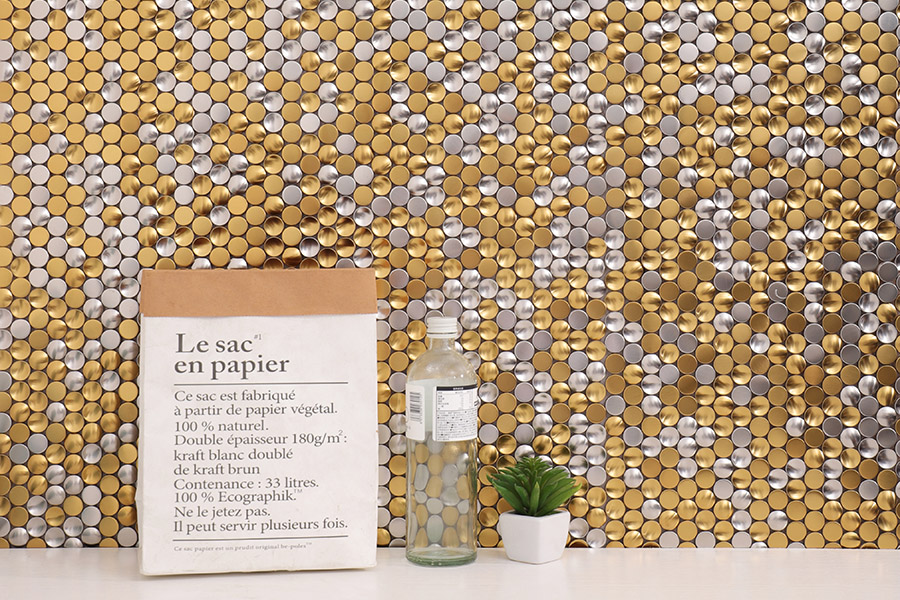 Mixed gold and silver metallic penny tiles with 3D concave and flat surfaces.