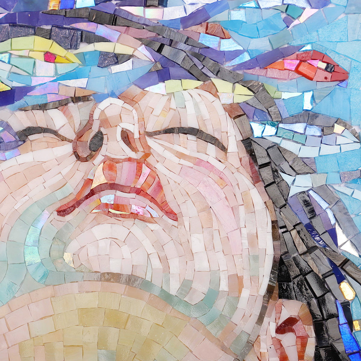 Close-up of lips and serene expression in mosaic art