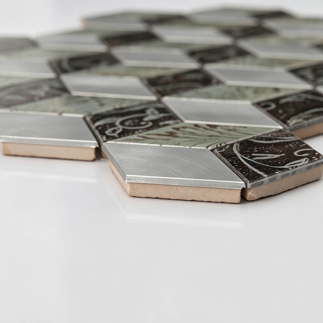 Side view showing ceramic base and metallic surface of mosaic tile.
