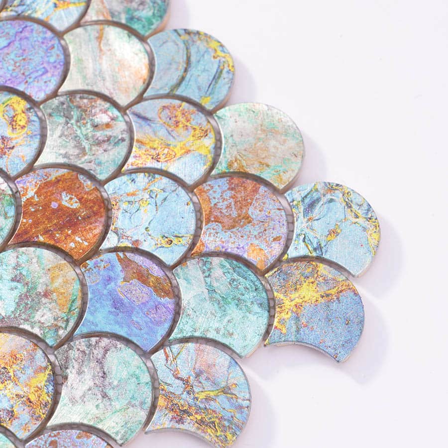 Corner closeup of multicolor fish scale mosaic tiles