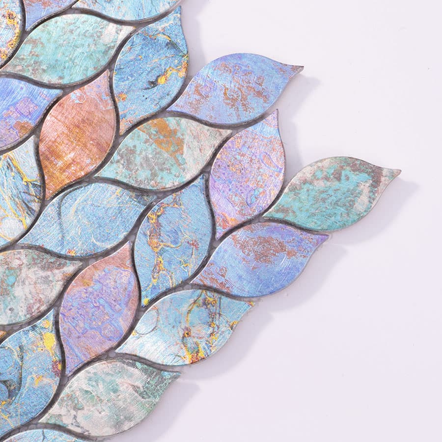 Close-up of multicolor aluminum leaf mosaic tile corner detail