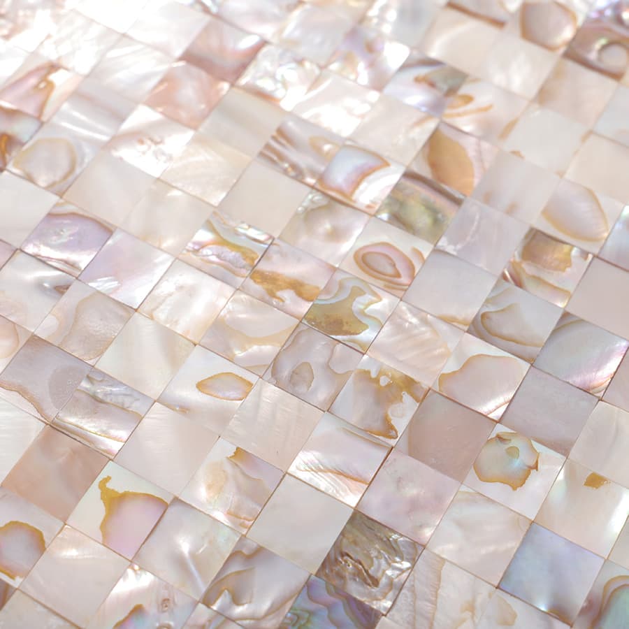 Natural patterns of glossy shell mosaic tile in close-up