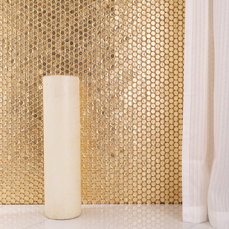 Gold foil glass mosaic tiles featured on a luxury bathroom wall