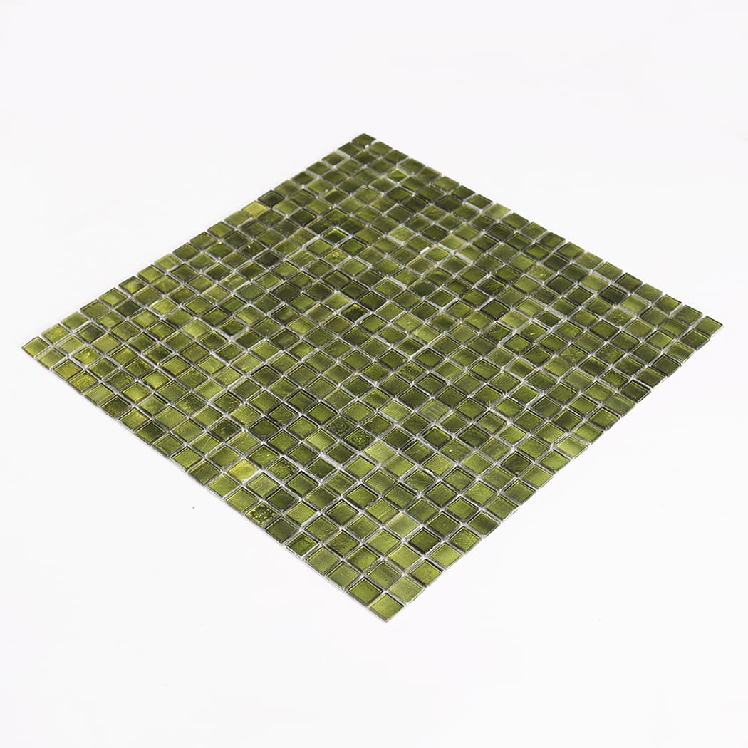 full sheet of olive green glass mosaic tiles photographed at low angle