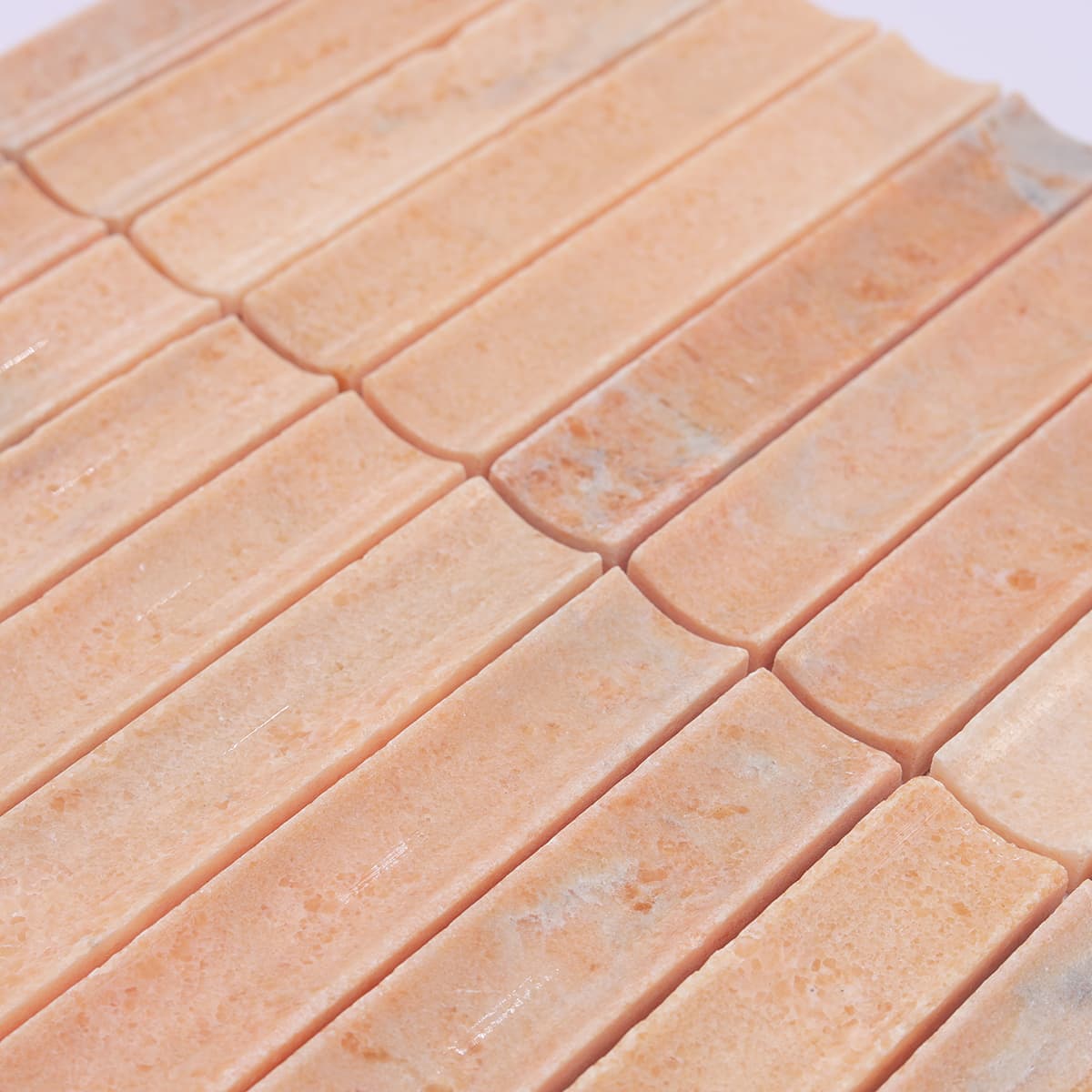 Slanted angle showing orange fluted tile curvature and finish