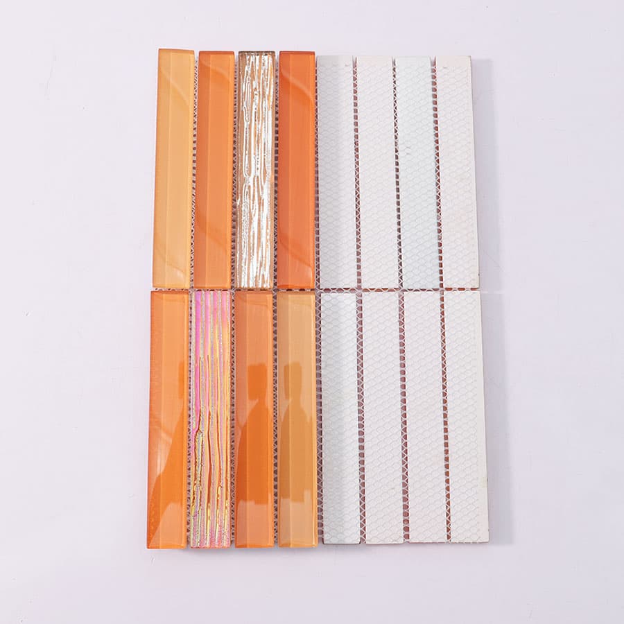 Back view of orange iridescent crystal glass mosaic wall tile with mesh backing