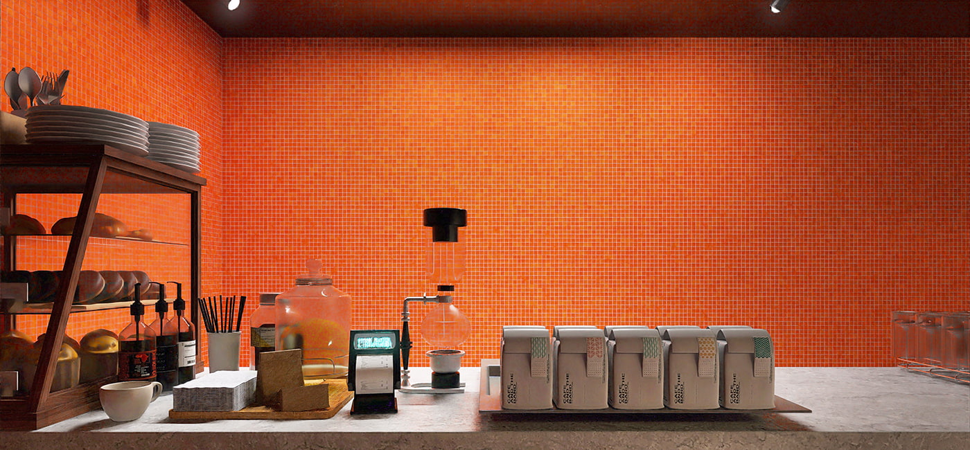 A wide view of a sleek countertop with orange mosaic backsplash and bakery display case