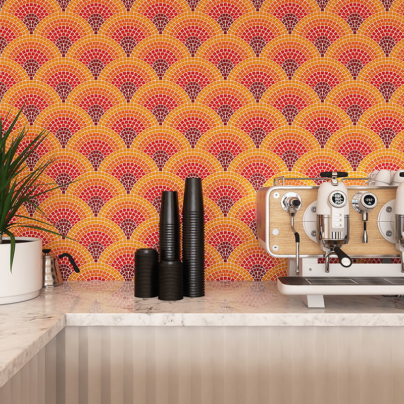 Vibrant orange and red glass fan mosaic backsplash with retro charm