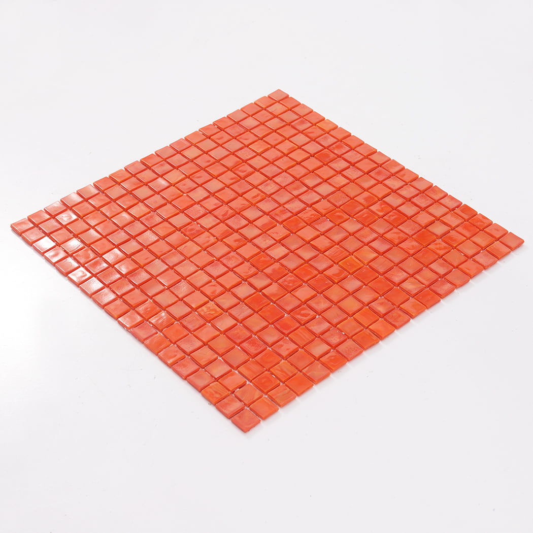 Angled view of a full orange square glass mosaic tile sheet