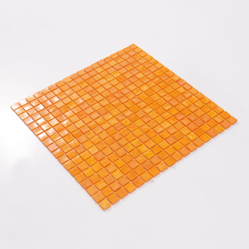 Angled view of a full orange yellow square glass mosaic tile sheet