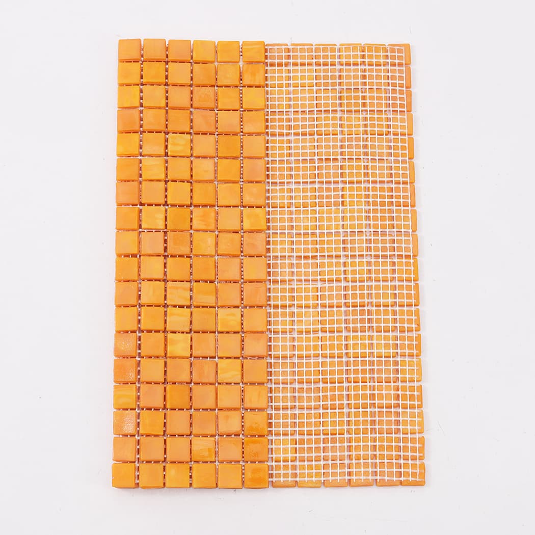 Orange yellow square glass mosaic tile sheet showing front and mesh backing