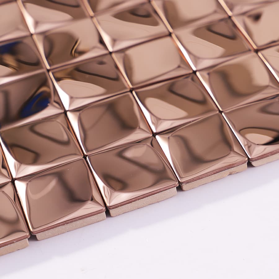 Close-up of rose gold 3D mini square tile edge detail