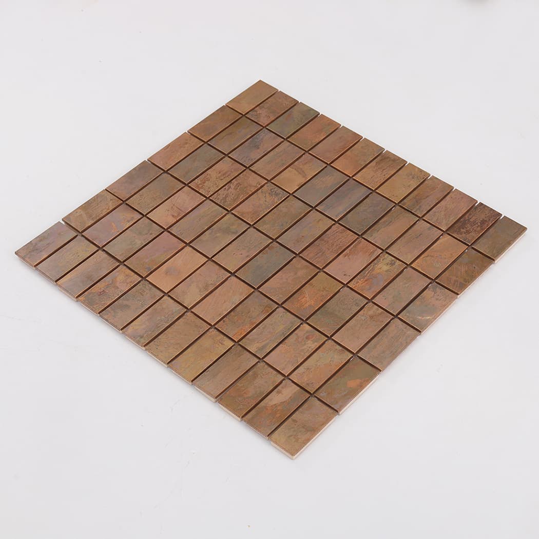 Angled view of oxidized copper rectangular mosaic tile sheet