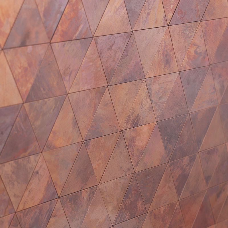 Oxidized triangular copper mosaic tiles with aged brown and bronze surface texture