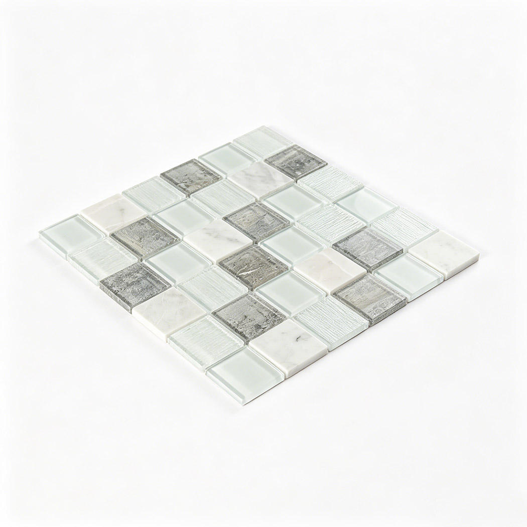 Angled sheet of pale aqua gray and white square glass mosaic tile