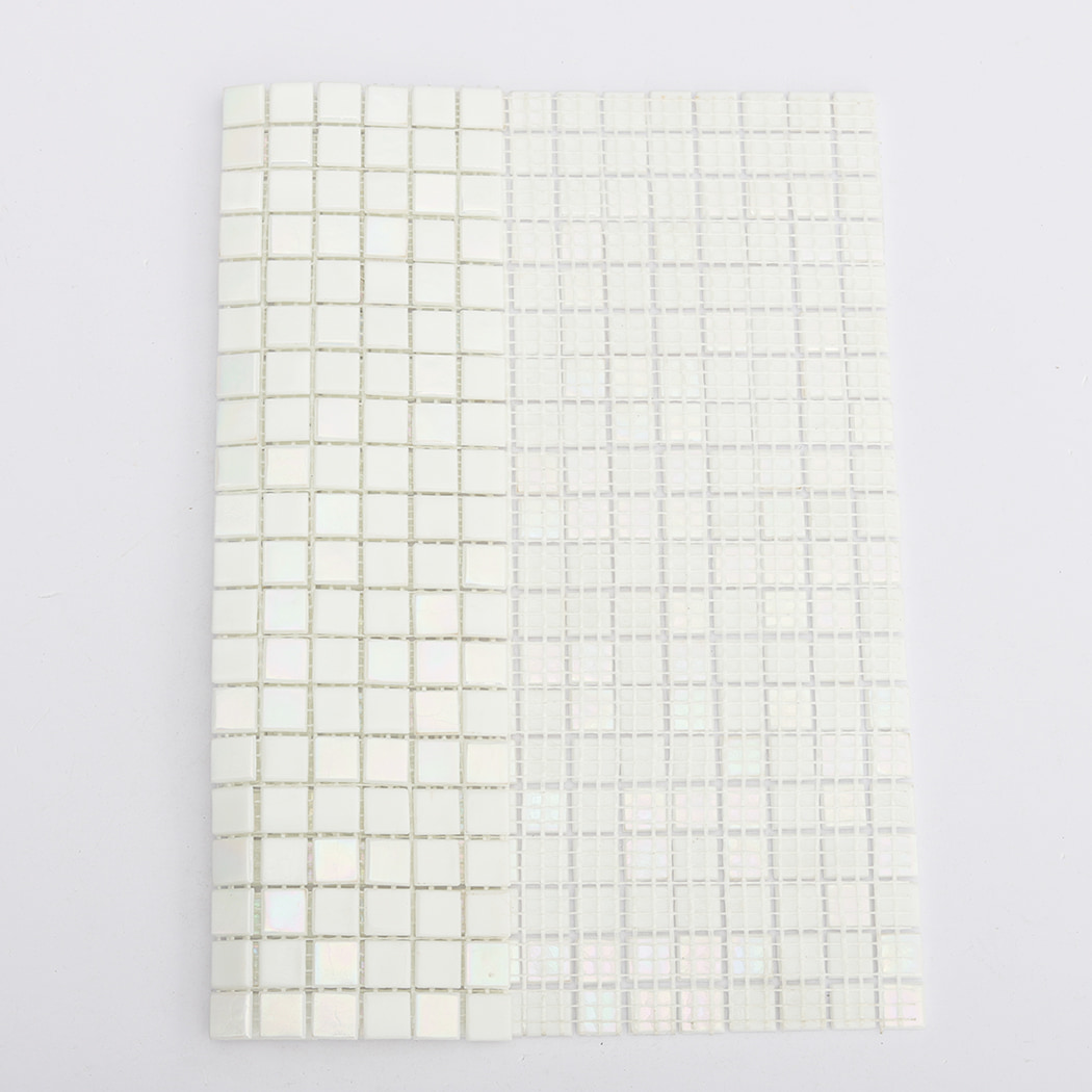 pearl white mosaic tile sheet showing tile face next to the mesh backing side