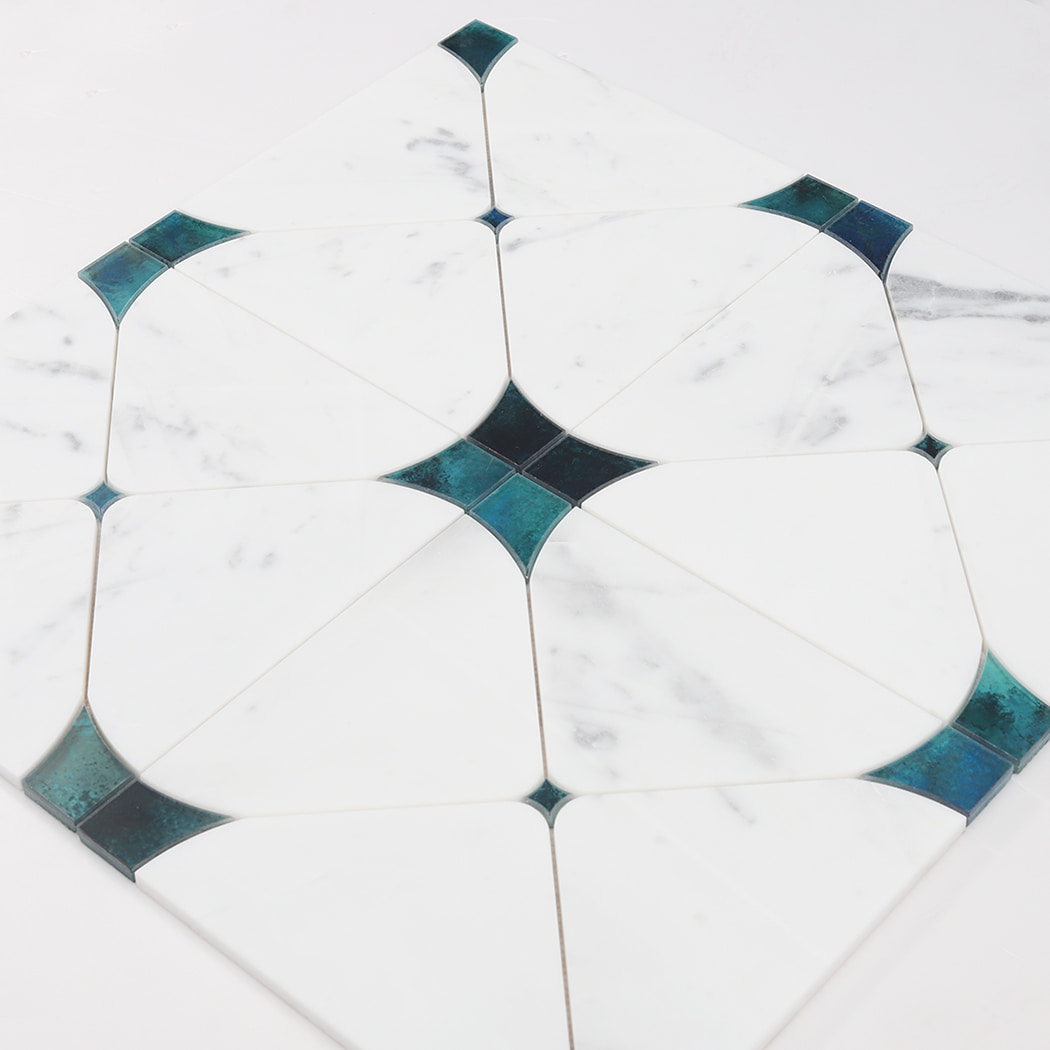 A perspective shot of multiple marble tiles joined together, highlighting the seamless pattern.