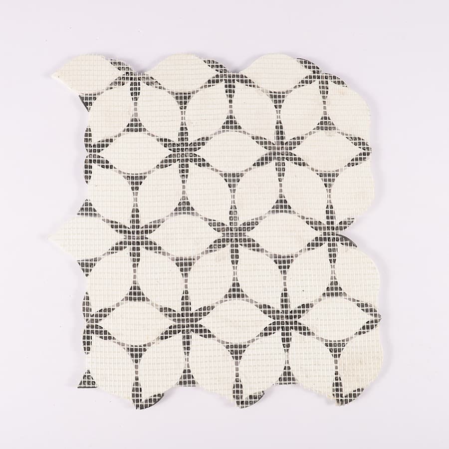 Back view of petal marble mosaic tile sheet with mesh backing.