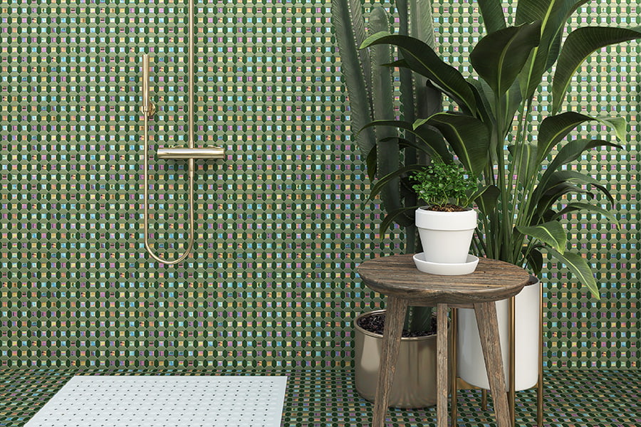 Picket tile shower with green tiles, tropical plants, and wooden table