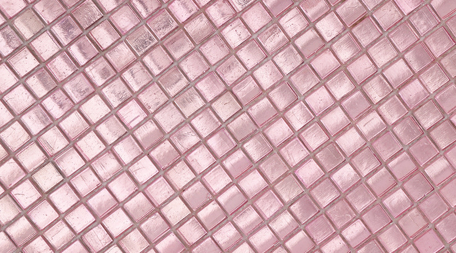  Close-up of glossy pink glass mosaic tiles showcasing smooth, iridescent surface 