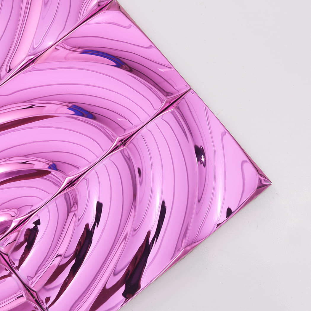 Corner close up of pink mirror ripple mosaic tile