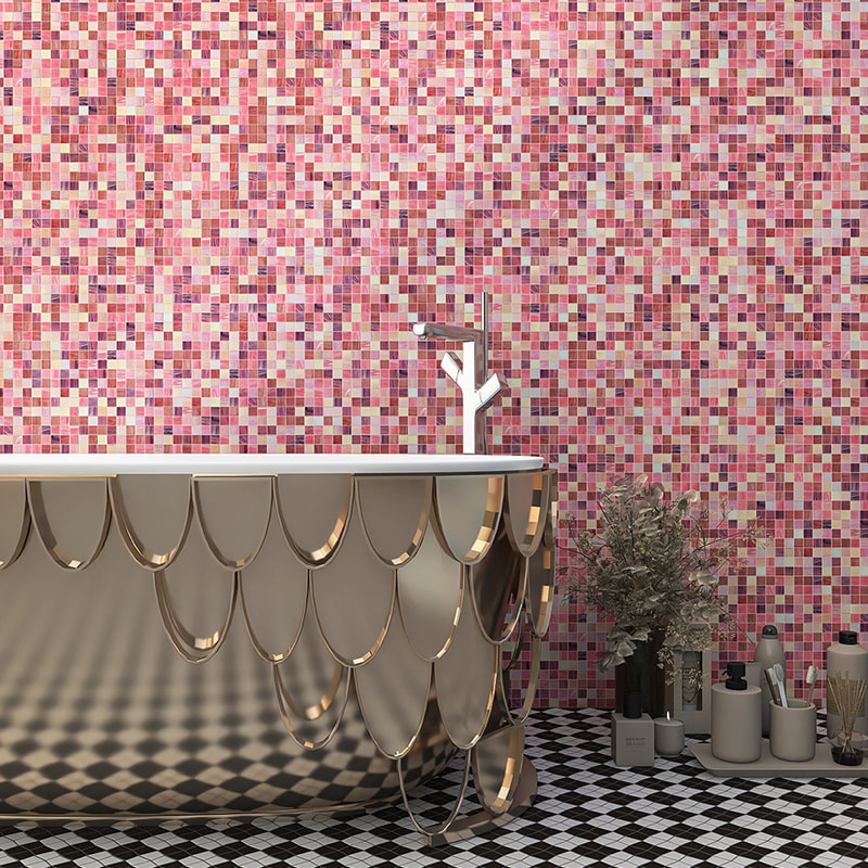 Close-up view of pink square mosaic tile wall behind a scalloped gold bathtub and checkered floor
