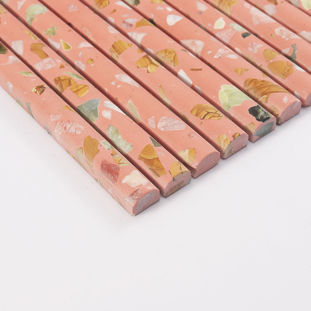 Edge profile of pink terrazzo curved strip mosaic tile with rounded ends