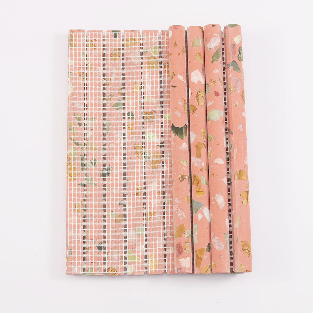 Back view of pink terrazzo fluted mosaic tile showing fiber mesh backing