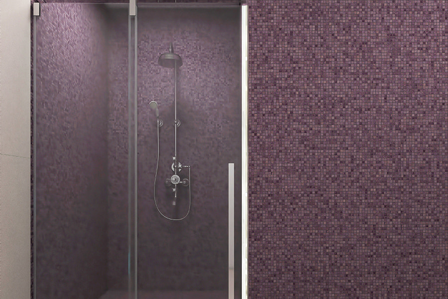  Frameless glass shower door with dark purple glass mosaic tile wall behind it