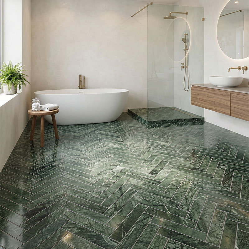 Rectangle floor tiles in green marble herringbone pattern for luxury bathroom.