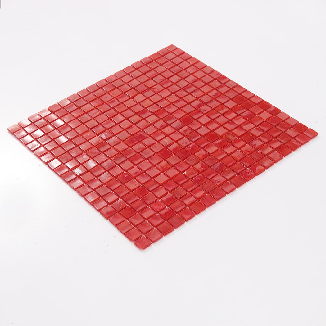 Angled view of a full red square glass mosaic tile sheet