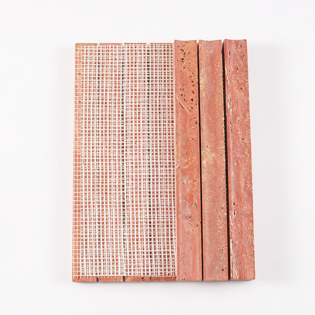 Red travertine curved fluted mosaic tile showing front strips and mesh backing