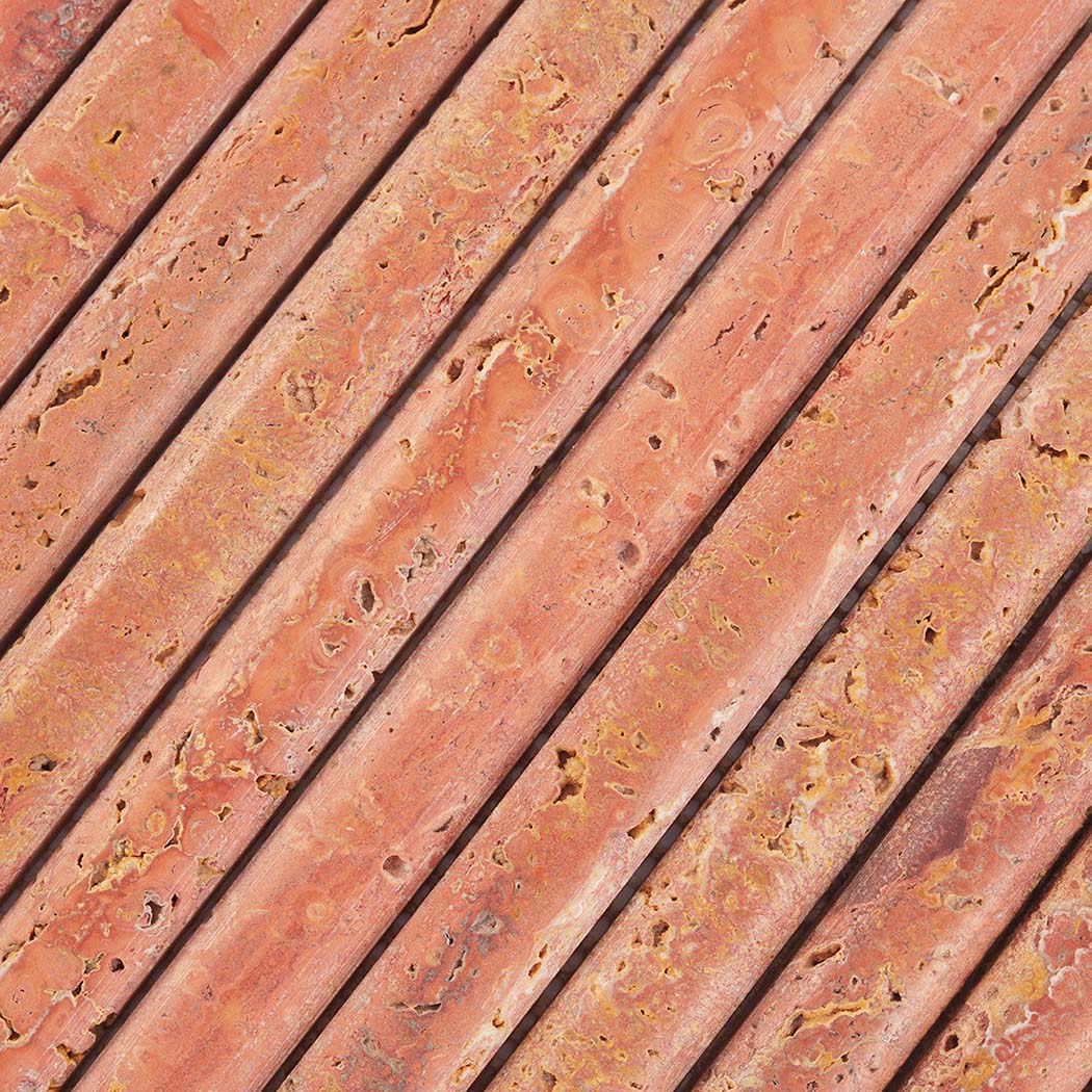 Detailed texture of red travertine linear rod mosaic tile with porous stone surface
