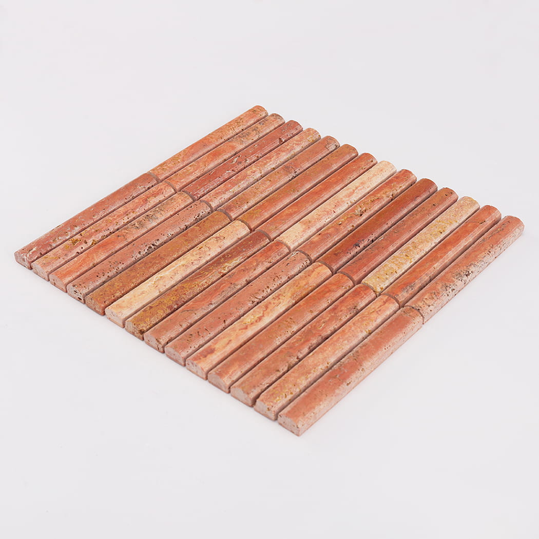 Full sheet of red travertine pencil mosaic tile displayed at an angle on a white surface.