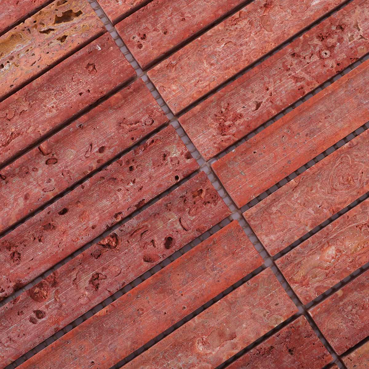 Side angle showing texture of red travertine mosaic