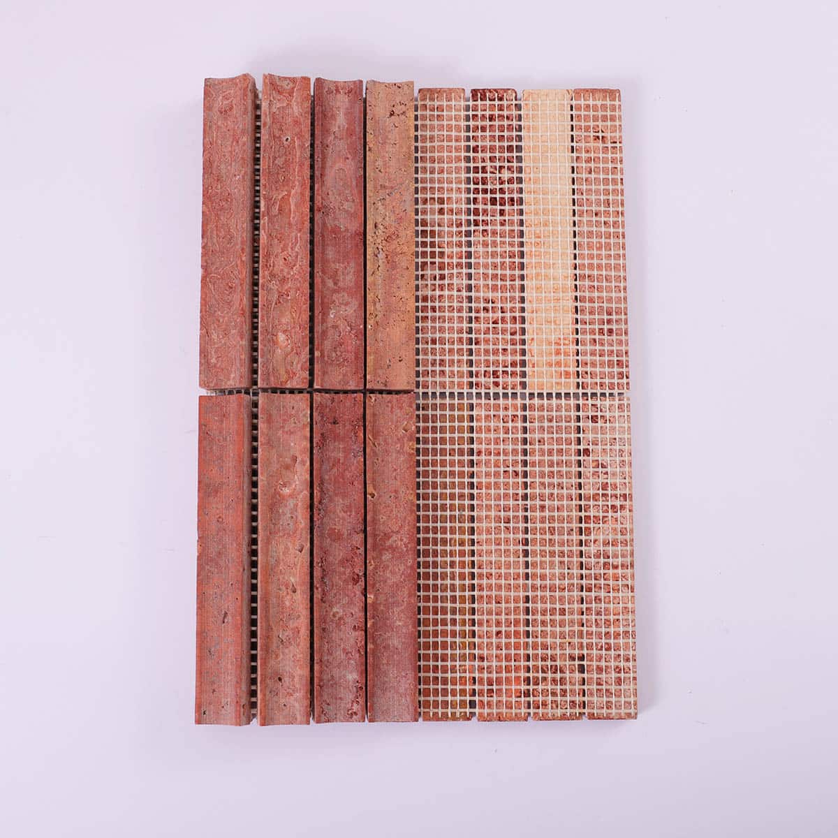 Back view of red travertine tile with mesh backing