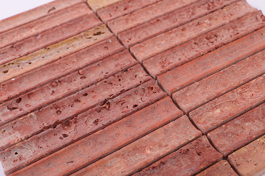 Red Travertine Tiles in a finger mosaic pattern with natural unfilled pores.