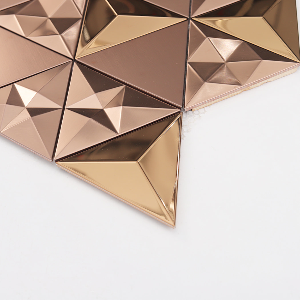 Detailed view of the corner of a rose gold 3D triangular tile sheet.