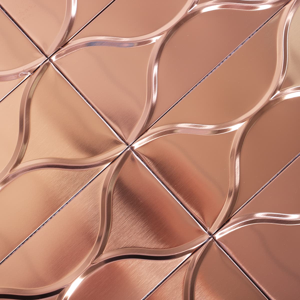 Close-up showing brushed texture and 3D curved design in rose gold