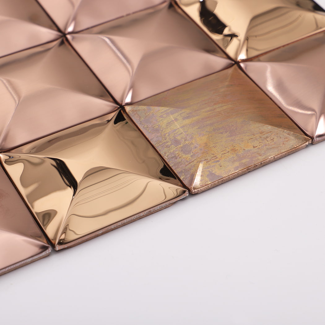 Side angle view of rose gold and copper metal 3D mosaic tile.