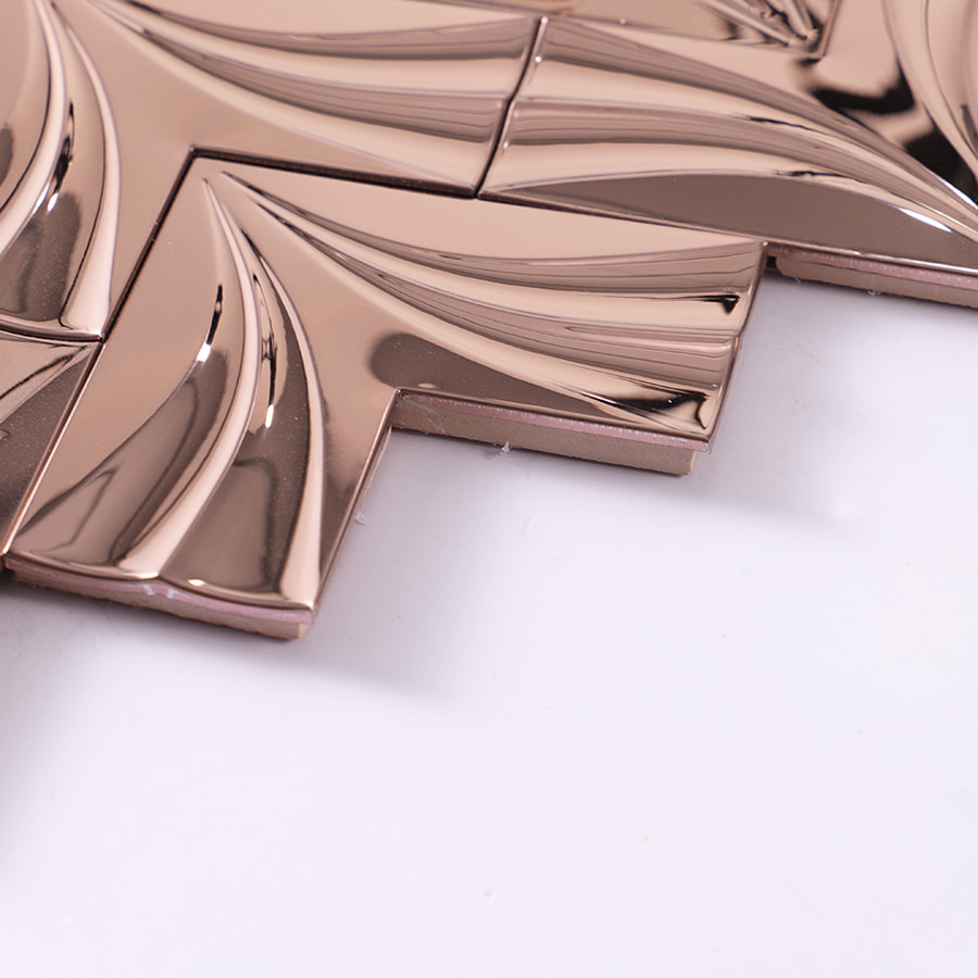 Edge thickness view of rose gold mirror chevron stainless steel mosaic tile