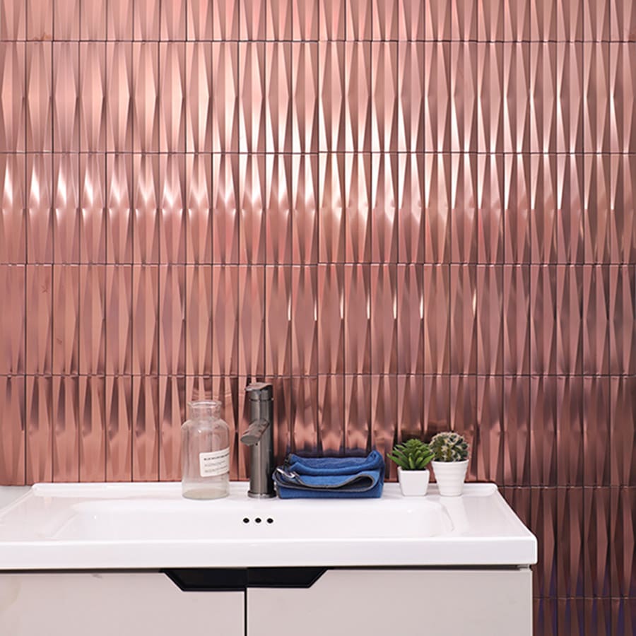 Rose gold stainless steel 3D wave strip mosaic tile installed on bathroom wall