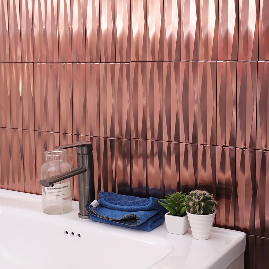 Rose gold stainless steel 3D wave strip mosaic tile used as sink backsplash