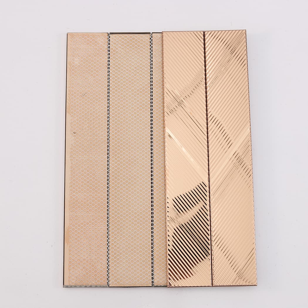 Back view of rose gold stainless steel vertical tile sample with mesh backing