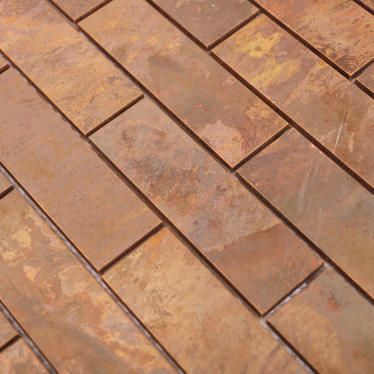 Corner detail of rustic copper brick mosaic tile