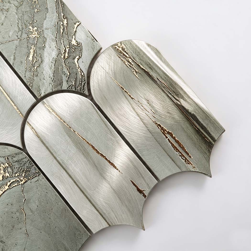 Macro shot of rounded top edge on sage green gold fish scale tile