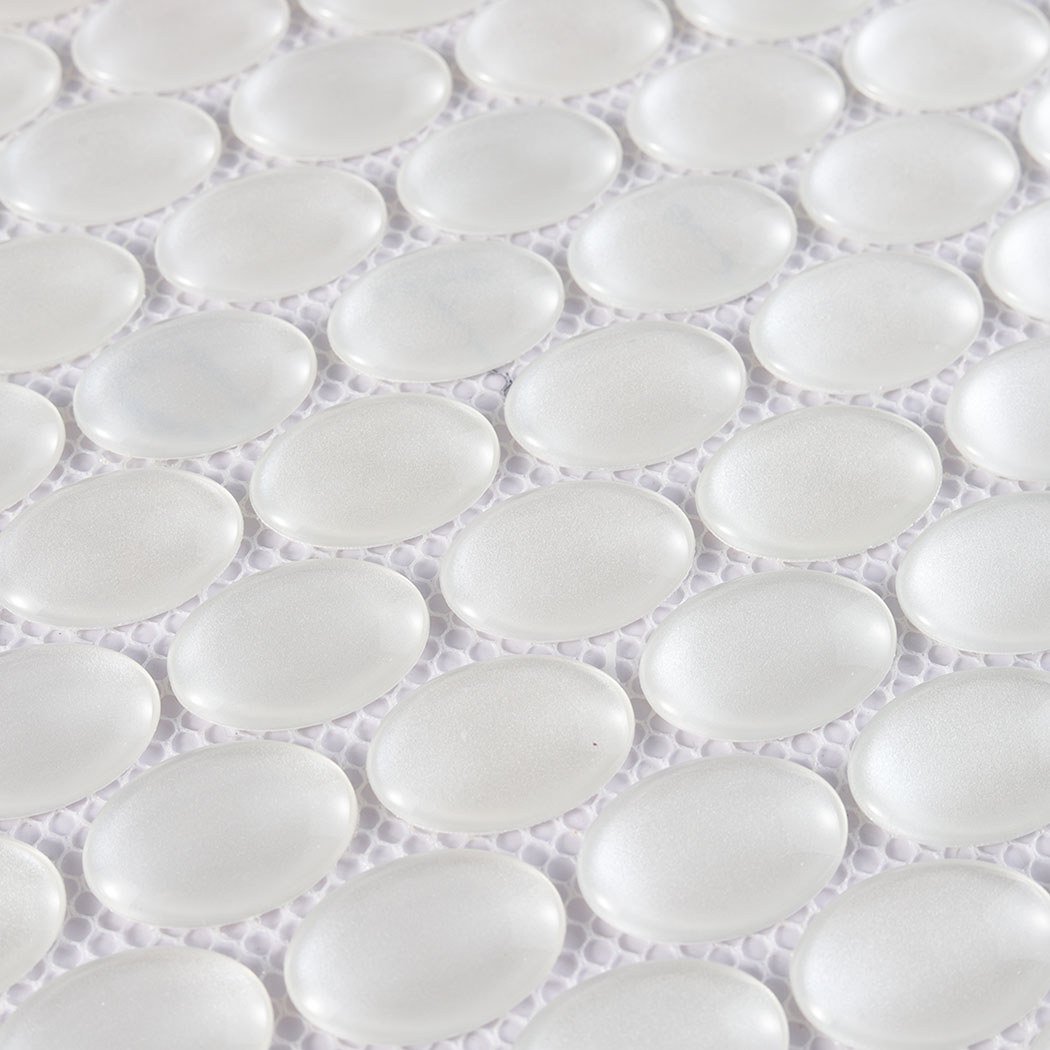 Close pattern of satin white oval glass mosaic chips with rounded raised edges