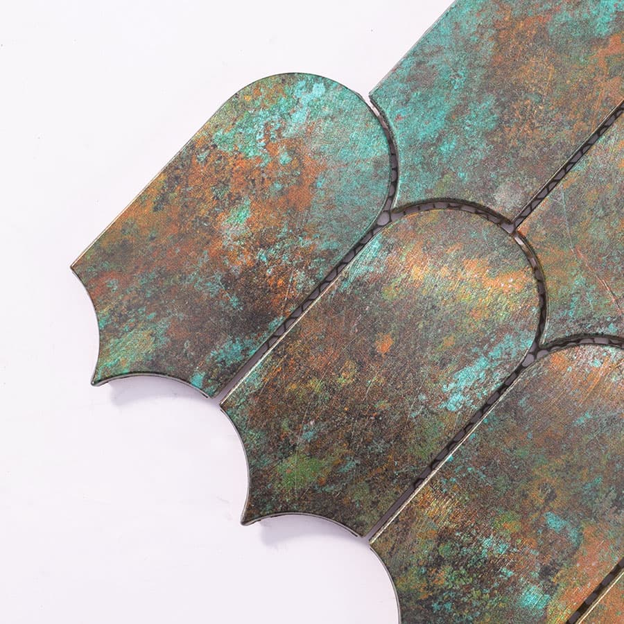  Close-up of corner tiles showing detailed green and bronze patina finish